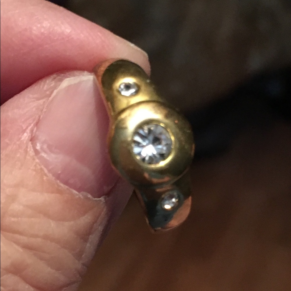 Three CZ and gold tone ring, size 7